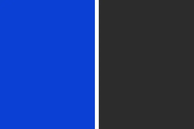 A vibrant blue on the left and a dark charcoal gray on the right, separated by a thin white line. Ideal living room color palette.