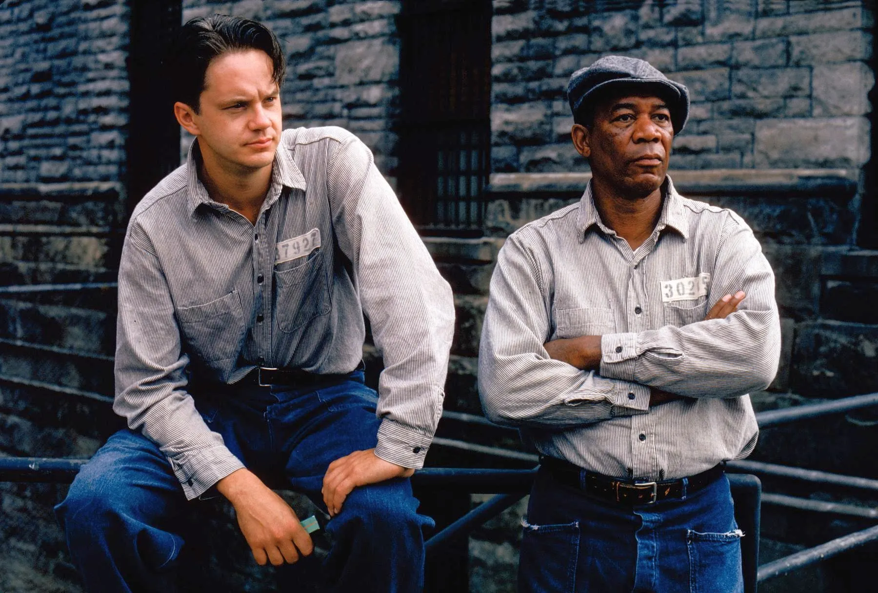 Tim Robbins and Morgan Freeman as Andy and Red in The Shawshank Redemption, a movie to watch on repeat.