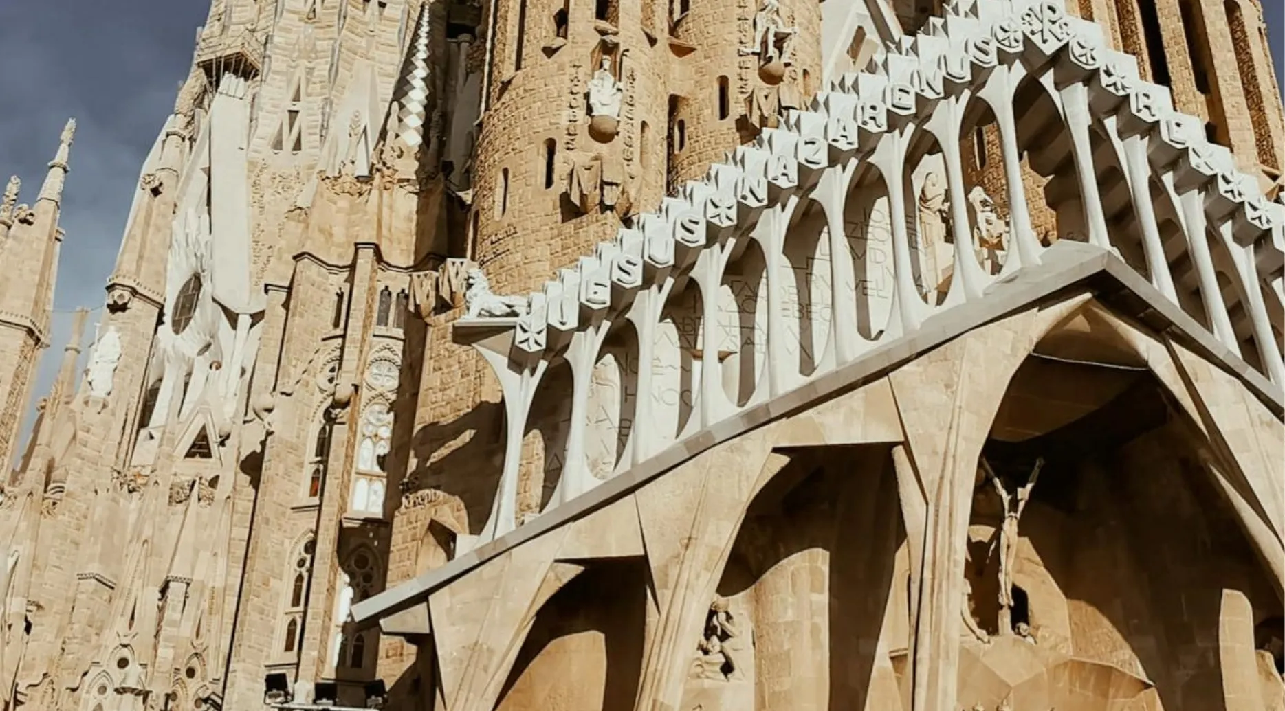 Zoomed-in photo of the Sagrada Familia's intricate stone facade. Can you guess the landmark?