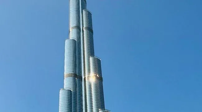 A close-up of the Burj Khalifa, a famous landmark, against a clear blue sky. Guess the landmark from this zoomed-in photo.