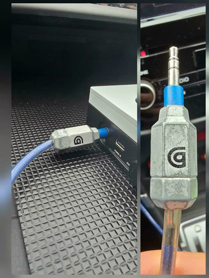 A durable blue auxiliary audio cable with a metal connector, representing old products still in daily use