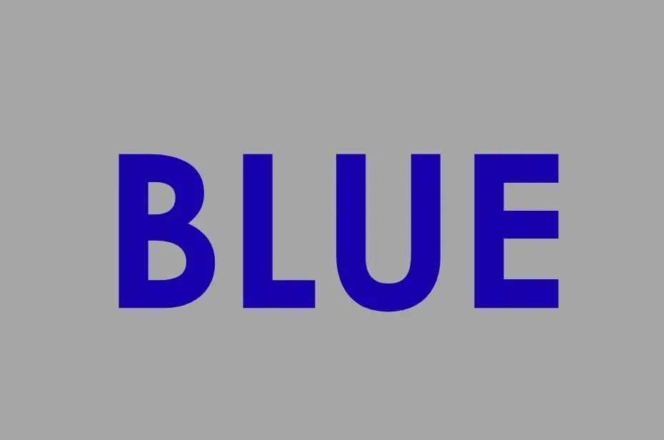 The word BLUE in bold, capital letters against a gray background. Focus on the word green.