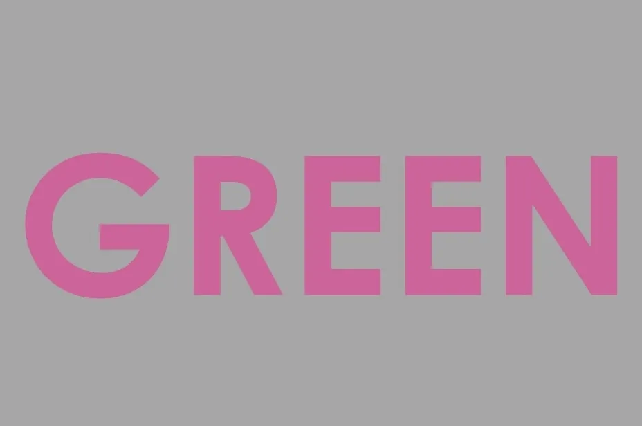 The word GREEN in bold pink letters against a gray background, suggesting an interactive element to tap the word green.