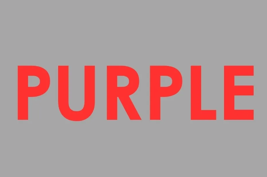 The word PURPLE in red text on a grey background. This image is not the color brown.