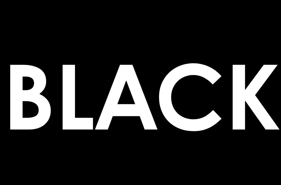 The word BLACK in bold white letters against a black background, contrasting with the concept of a white background.