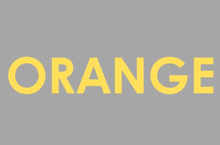 The word "ORANGE" in yellow capital letters on a solid gray background. The text is bold and centered.