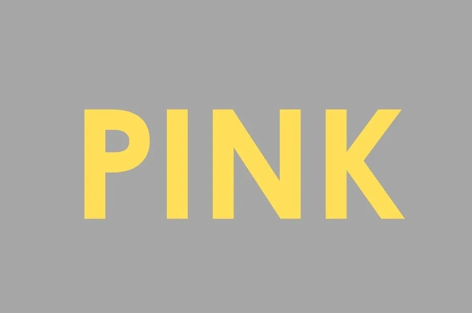 The word PINK in yellow capital letters on a grey background, challenging perception and asking you to click the word red.