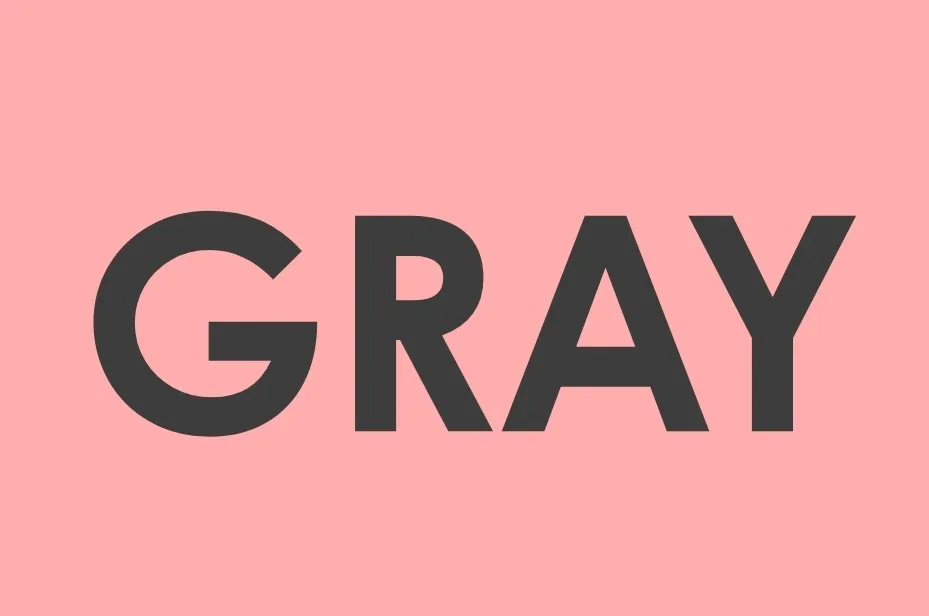 The word GRAY in dark charcoal on a light salmon background. Click the blue background for more color concepts.