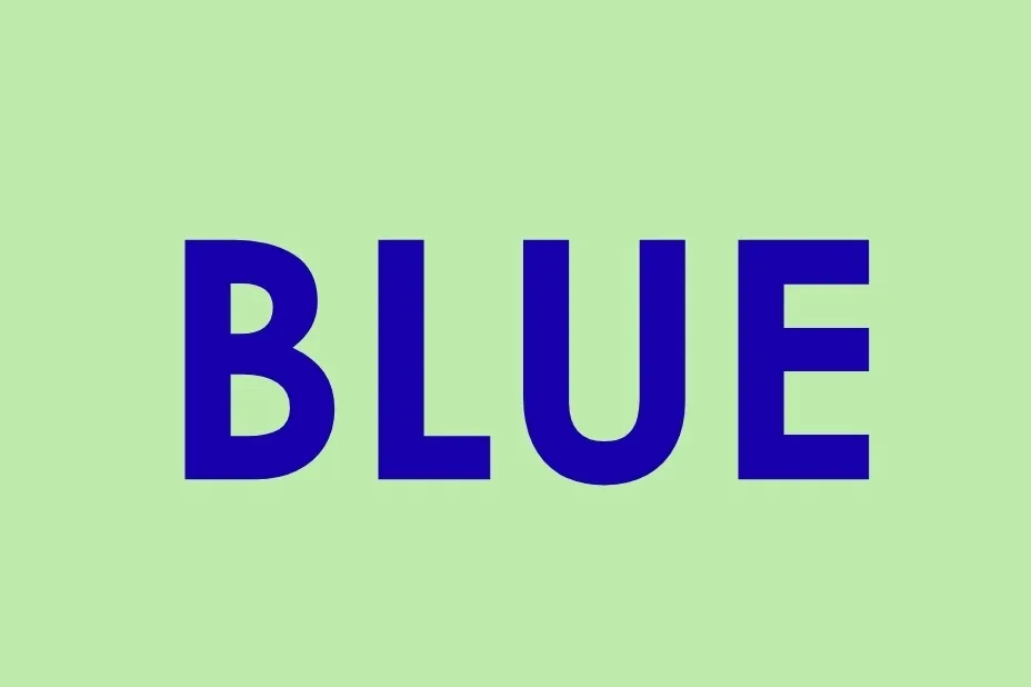 The word BLUE in bold royal blue letters against a pale green background. Click the blue background.
