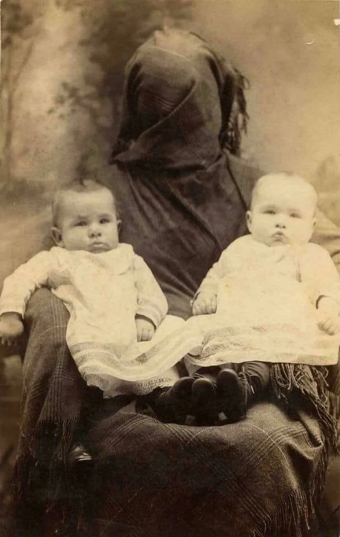 “Hidden Mother” Photo. Mothers Needed To Assist In Keeping Children Still Enough For The Long Exposure Necessary For A Successful Photo In Victorian Times