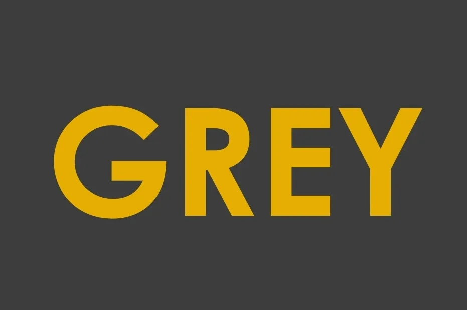 The word GREY in gold text on a dark grey background. Choose the color white for better contrast.