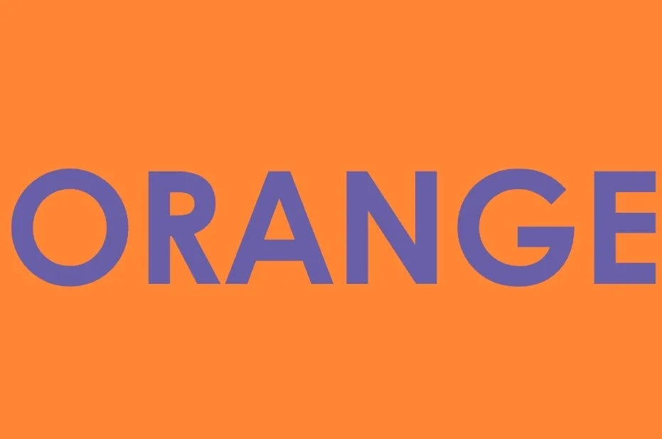 The word "ORANGE" in blue text against an orange background, not the color red.