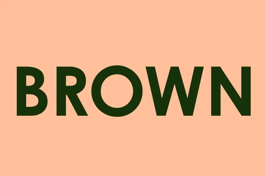 The word BROWN in dark brown letters on a peach background, a color that is not red.