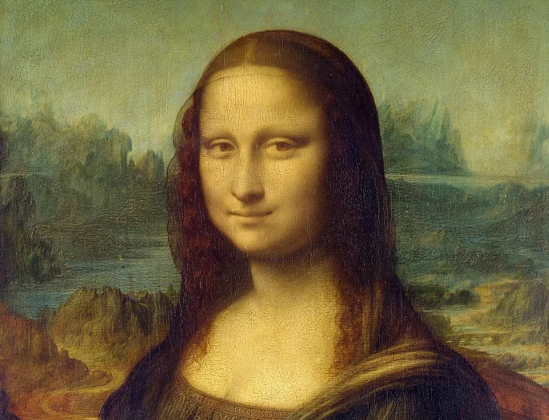 A close-up of the Mona Lisa painting, featuring her famous enigmatic smile. Test your general knowledge quiz skills!