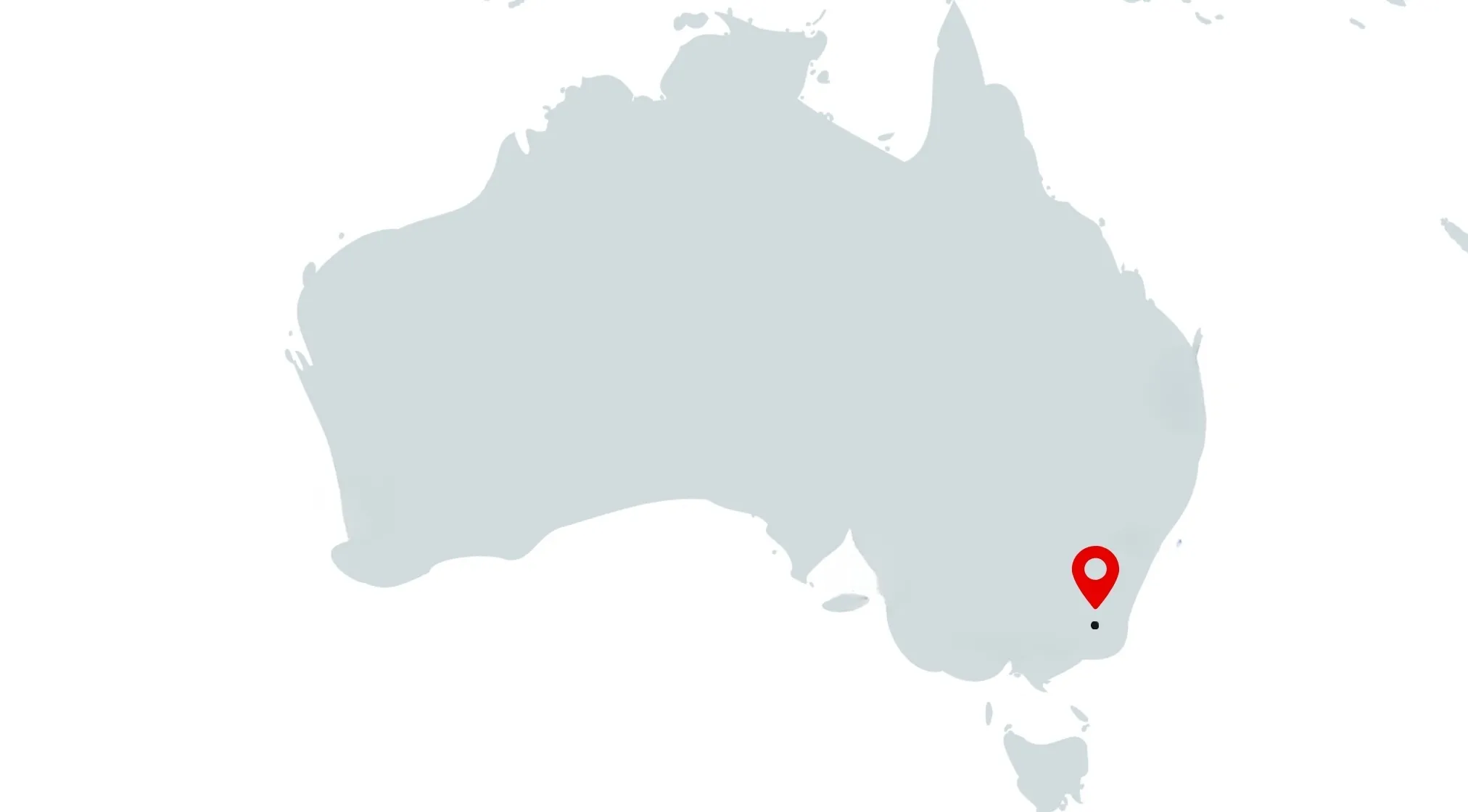 A borderless map of Australia with a red location pin pointing to Canberra, the capital city. Guess the capital.