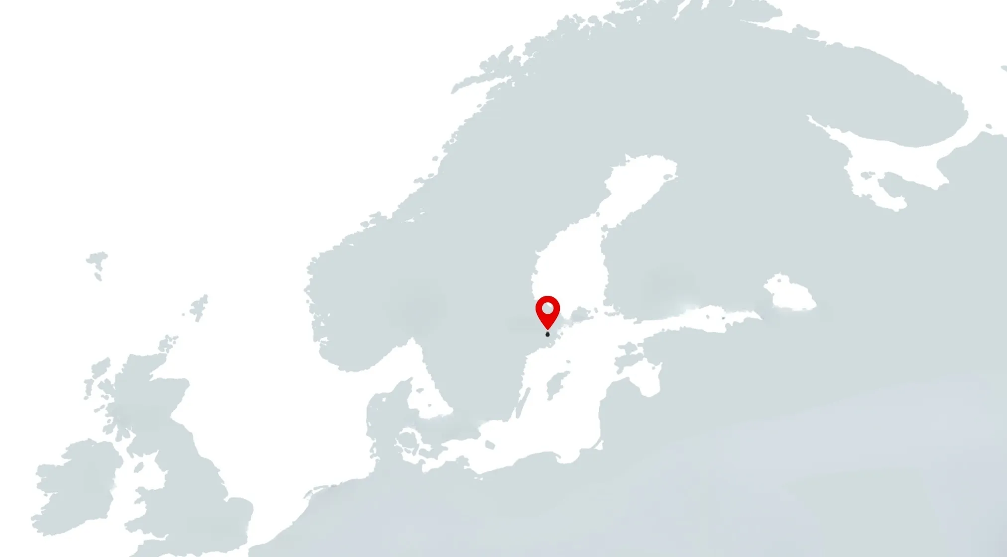 A simplified, borderless map of Northern Europe with a red map pin locating a capital city in the Baltic Sea.