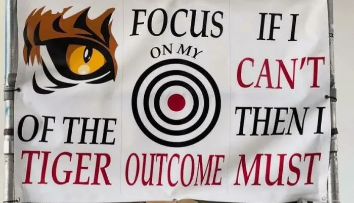 Banner with confusing and poorly spaced motivational quote design fail
