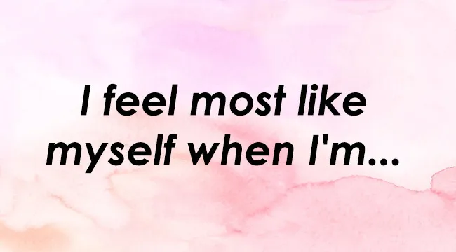 Text overlay on a pink watercolor background, reading, I feel most like myself when I'm... Finish this sentence to experience joy.