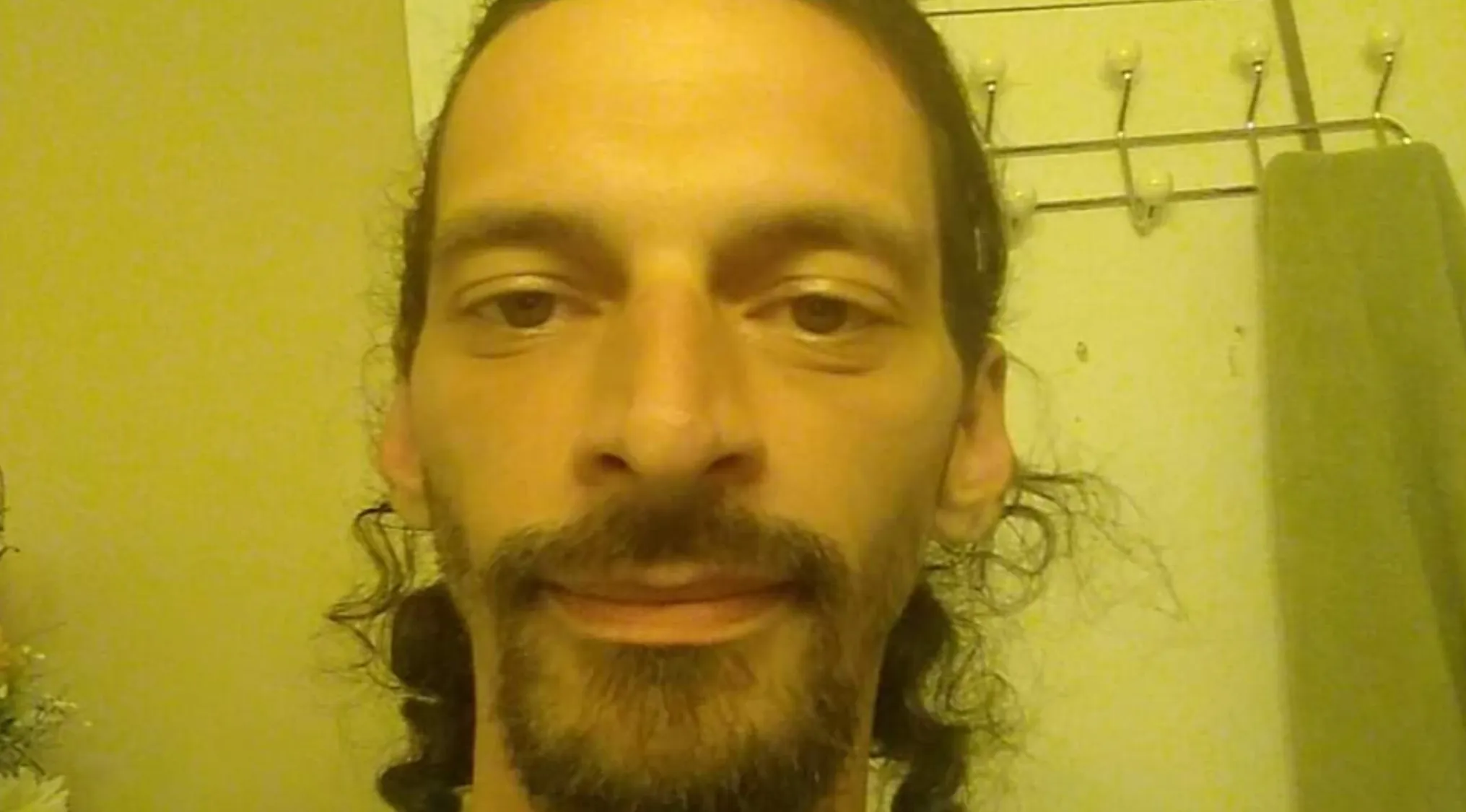 A man with a beard, mustache, and long hair. Who does this person look like? Celebrity doppelgangers.