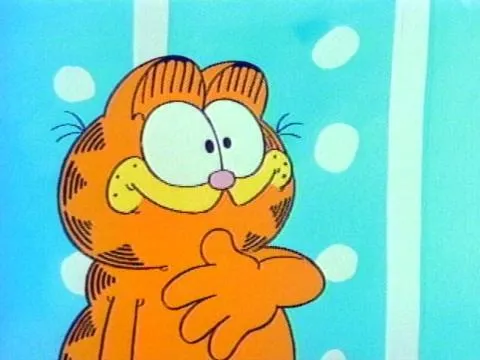 Garfield, the orange tabby cat, from a Saturday morning cartoon, looking left with a smirk on his face.