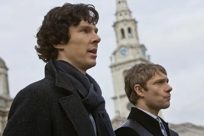 Sherlock & Watson looking thoughtfully into the distance with a clock tower in the background, embodying an iconic duo.