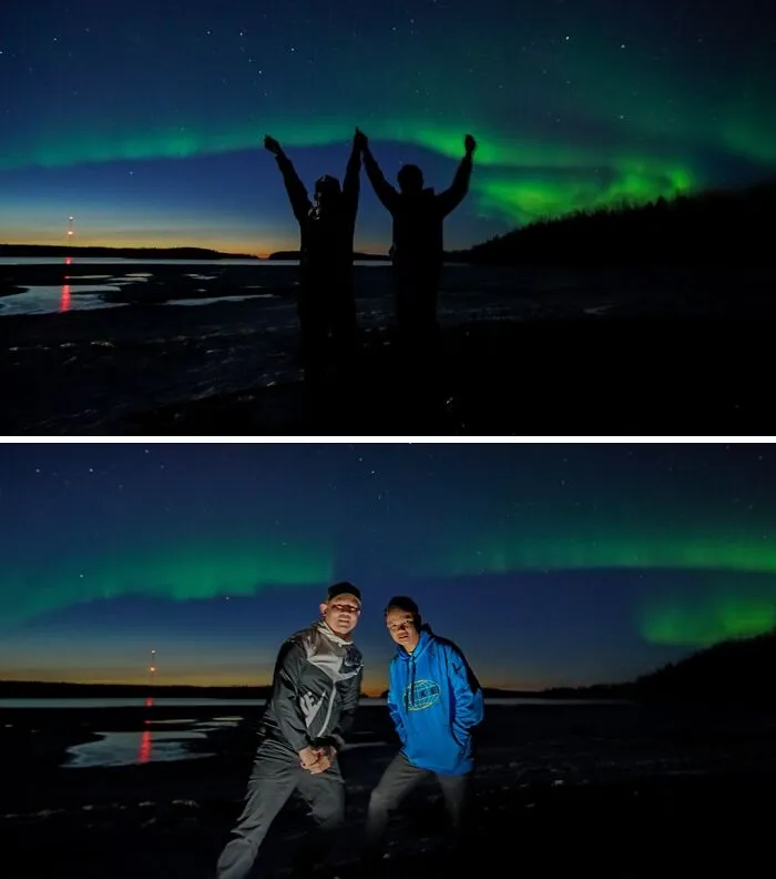 Two men silhouetted against the Northern Lights, capturing moments with amazing fathers.