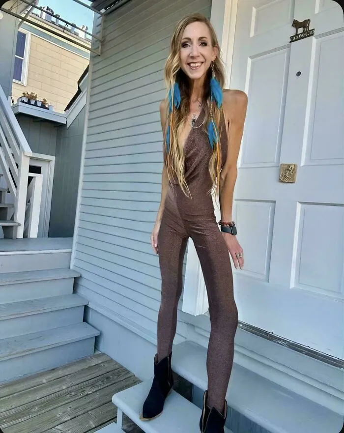 A woman smiling on a porch with legs edited to look incredibly thin, demonstrating Instagram Reality.