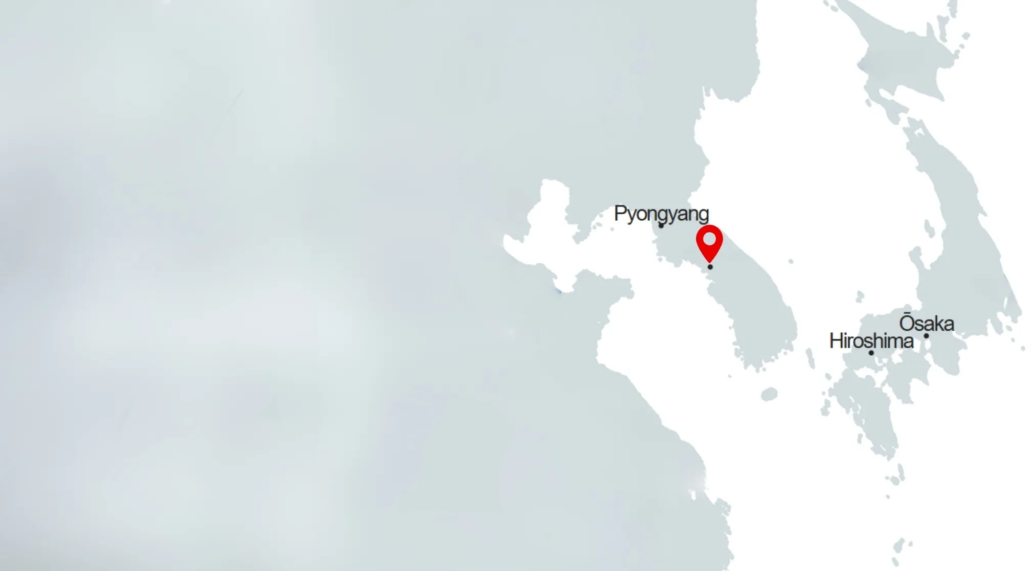 A borderless map highlighting the capital city of Pyongyang with a red pin, near Osaka and Hiroshima. Guess the capital.