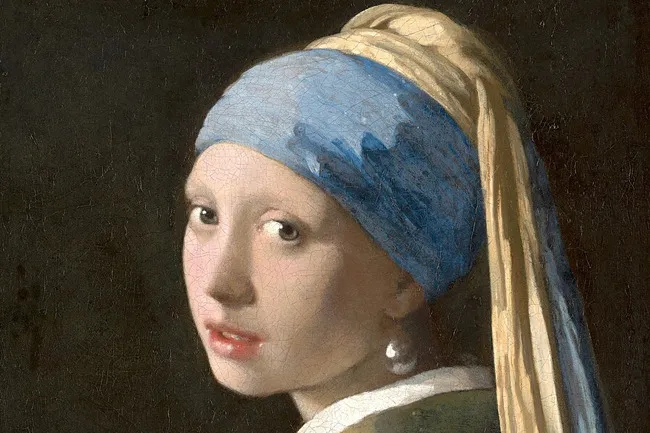 Johannes Vermeer's Girl with a Pearl Earring, an iconic artwork of a girl wearing a blue and yellow turban.