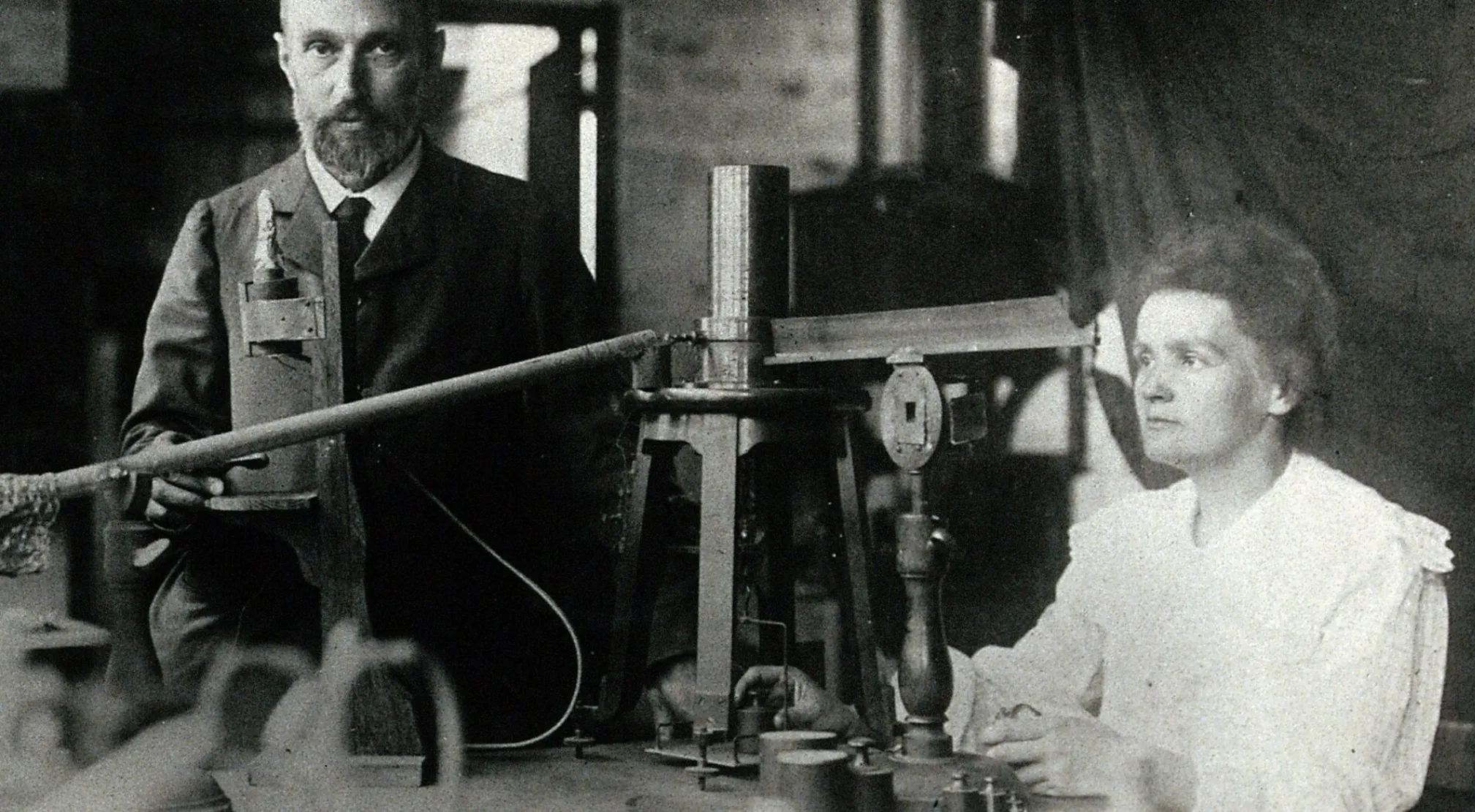 Marie Curie and Pierre Curie conducting research in their lab. General Knowledge about Europe: Marie Curie's Nobel-winning work.