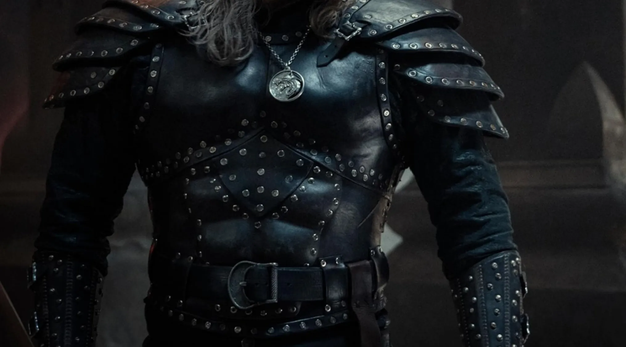 TV Show Outfits: Close-up of black studded leather armor, an outfit from The Witcher.