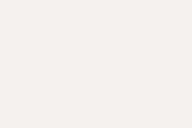 A solid background of light gray, almost white, a simple image that encourages one to pick a color.