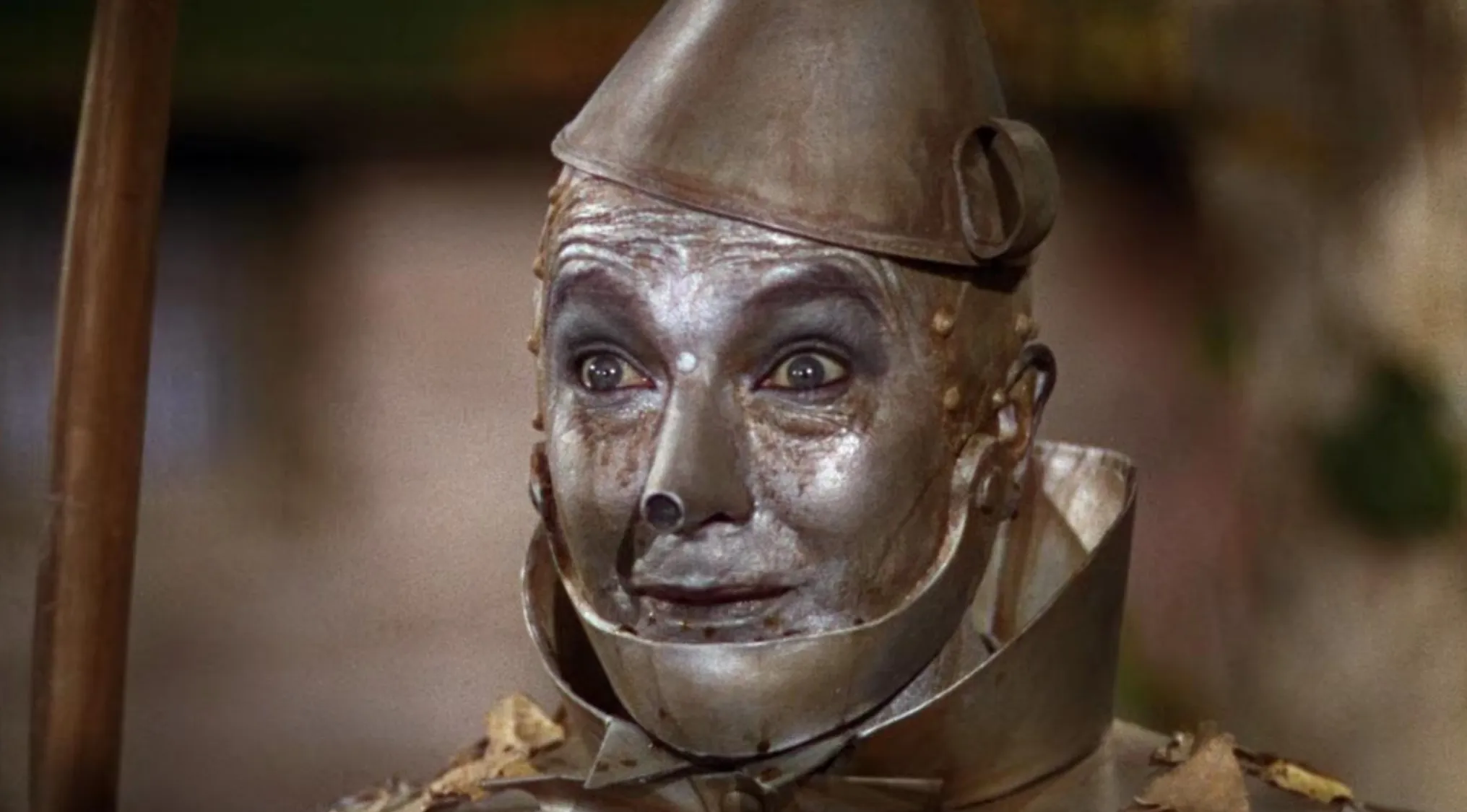 A close-up of the Tin Man from The Wizard of Oz, looking up with wide eyes. General Knowledge trivia.