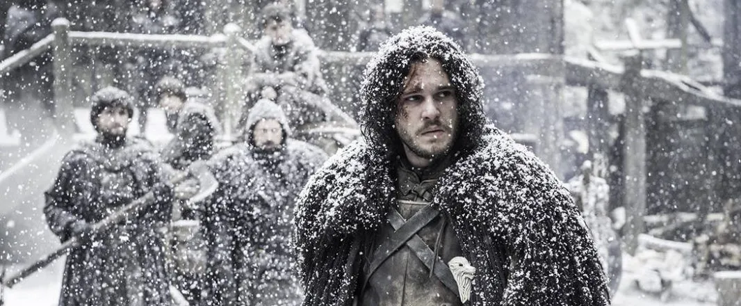 Kit Harington as Jon Snow in a snowy scene, with the catchphrase Winter is coming.