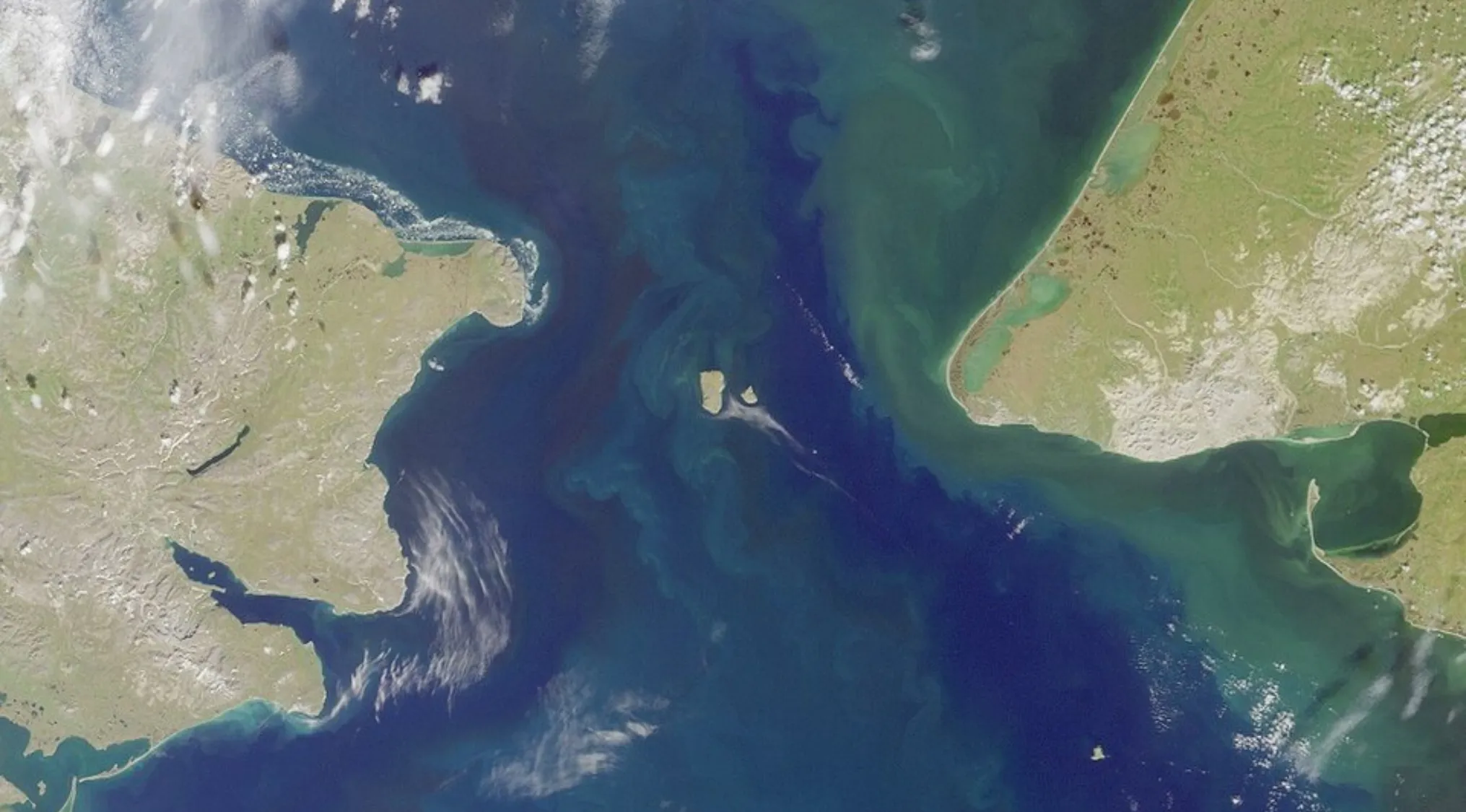 Satellite view of the Bering Strait, the body of water separating Asia and North America. General Knowledge Test for high IQs.
