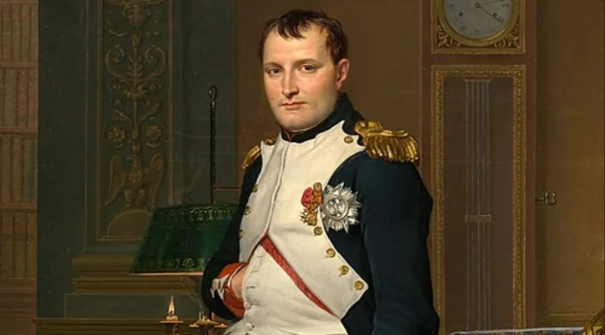 Painting of Napoleon Bonaparte in uniform. A general knowledge test question relates to his defeat in 1815.