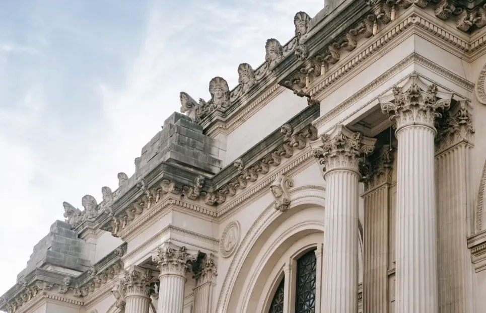 Classical architecture features a row of decorated columns supporting a roof, hinting at General Knowledge for High IQs.