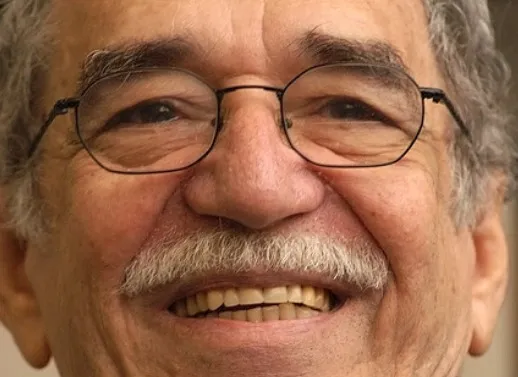 Close-up of smiling Gabriel García Márquez, wearing glasses and a mustache. Nobel Prize in Literature winner.