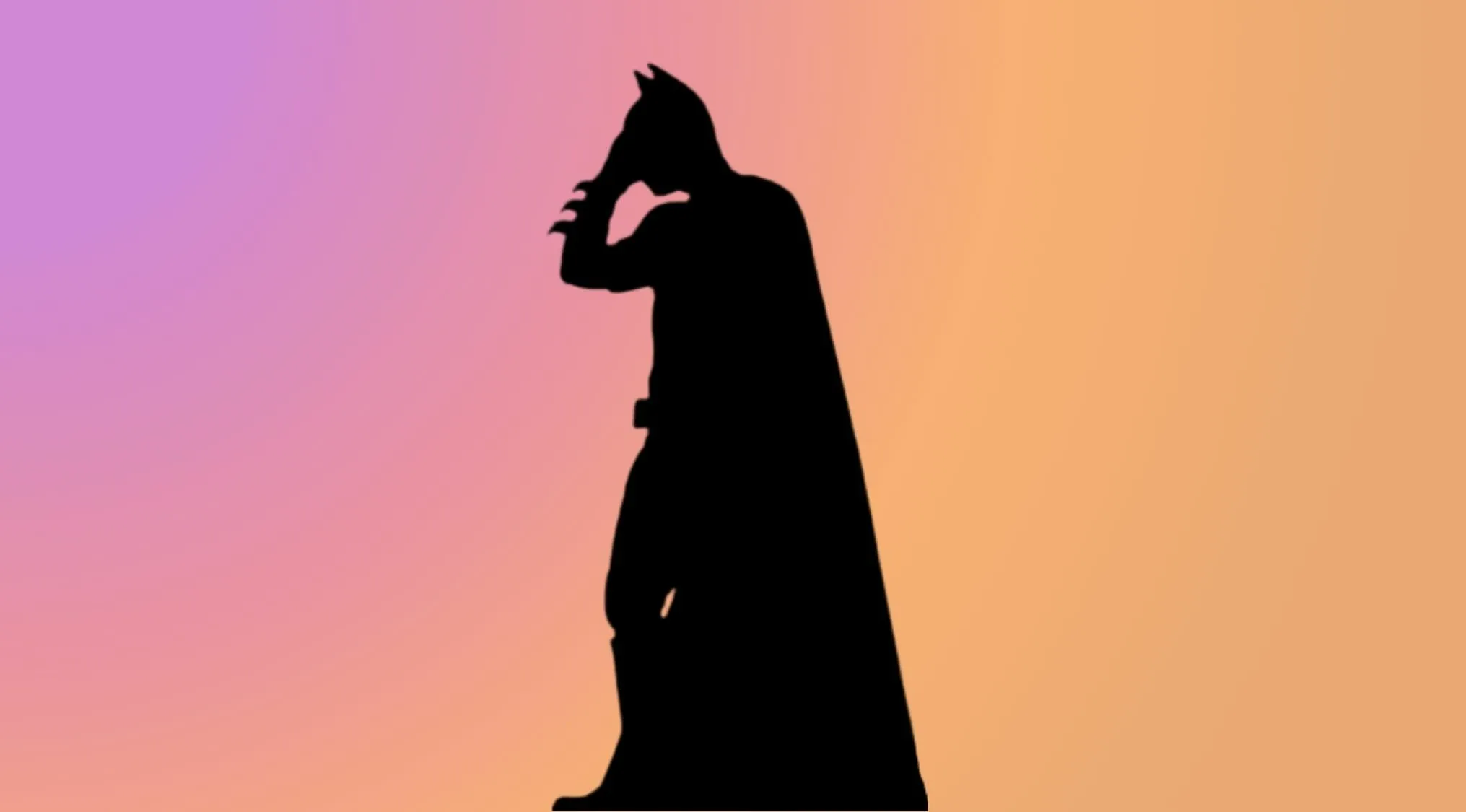 A black silhouette of a superhero with a cape and pointed ears, against a warm gradient background.