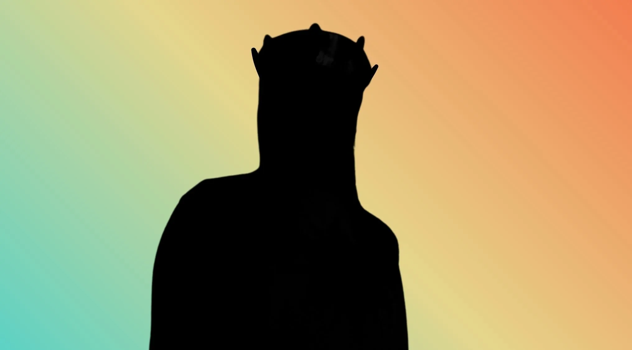 Silhouette of a comedy film character wearing a crown, posing the question of its movie origin.