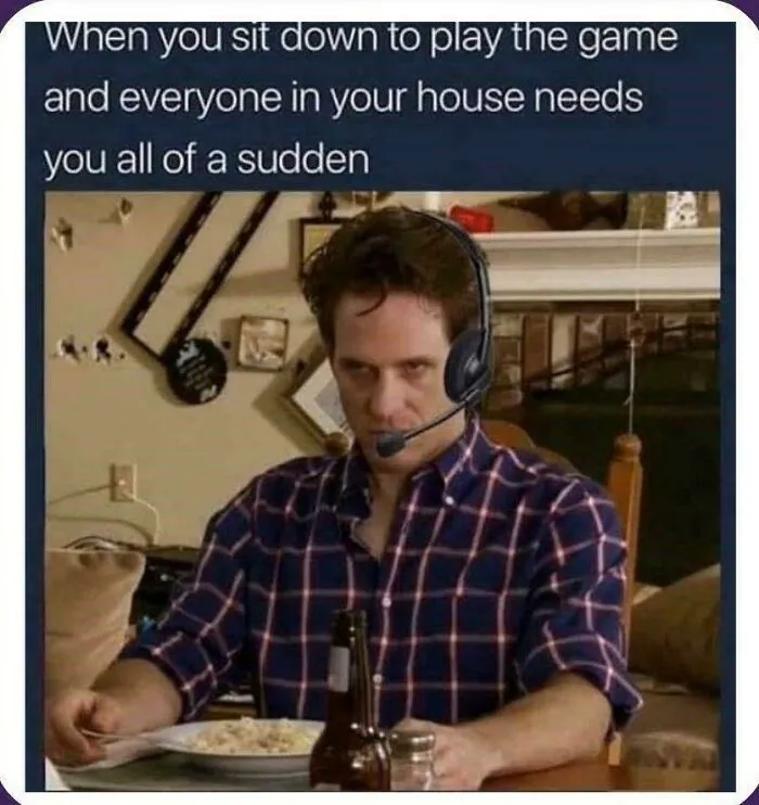 A meme showing a man in a headset looking annoyed at a table, highlighting the interruption of gaming.
