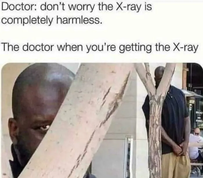 A meme shows a man looking suspiciously from behind a tree, representing a doctor during an X-ray.