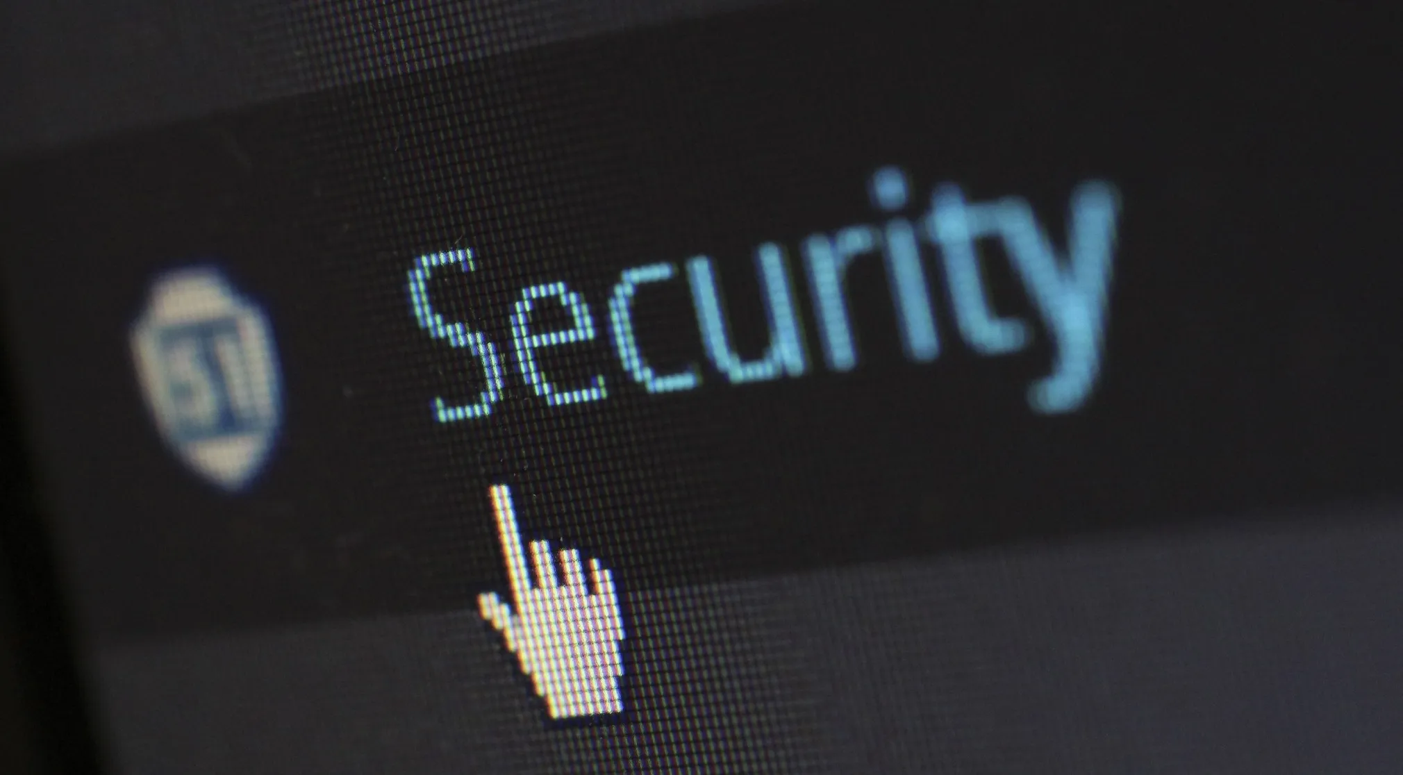 A computer screen showing the word Security and a mouse pointer. Learn how two-factor authentication (2FA) protects you.