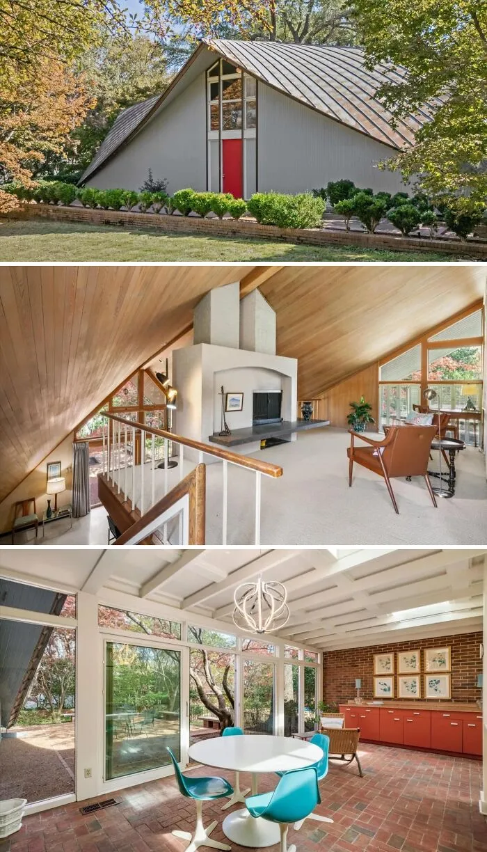 A modern cool A-frame house with a striking red door and a distinctive roofline, set amidst a well-maintained garden.