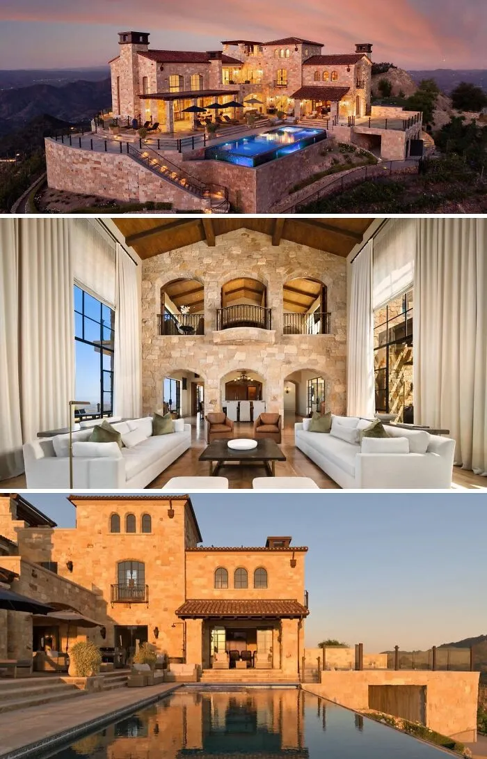 A cool and unusual luxurious home on a hill, featuring stone architecture, a large pool, and elegant interiors.