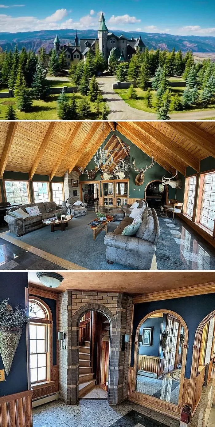 A majestic castle-like, unusual home nestled in a forest with an impressive interior featuring taxidermy and vaulted ceilings.