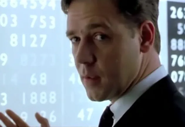 Russell Crowe as John Nash in A Beautiful Mind, with complex mathematical equations on a transparent board.