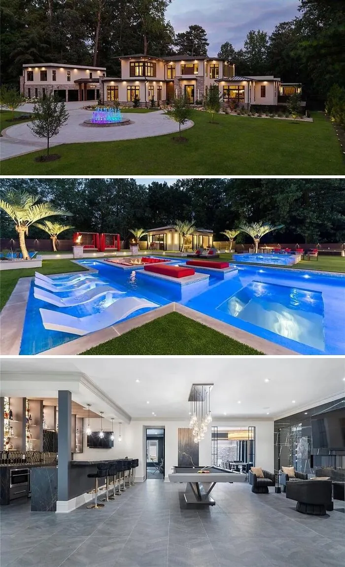 A large, modern unusual home with a circular driveway, an extensive pool area with lounges, and a stylish interior.