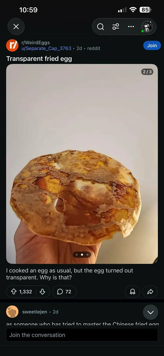 A hand holding an oddly transparent fried egg, showing a questionable food combo.