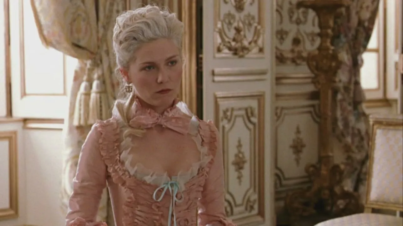 Marie Antoinette in opulent 18th-century attire, depicting the early stages of the French Revolution, a major historic event.